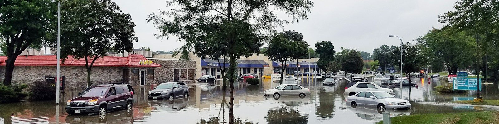 cars on flooded street